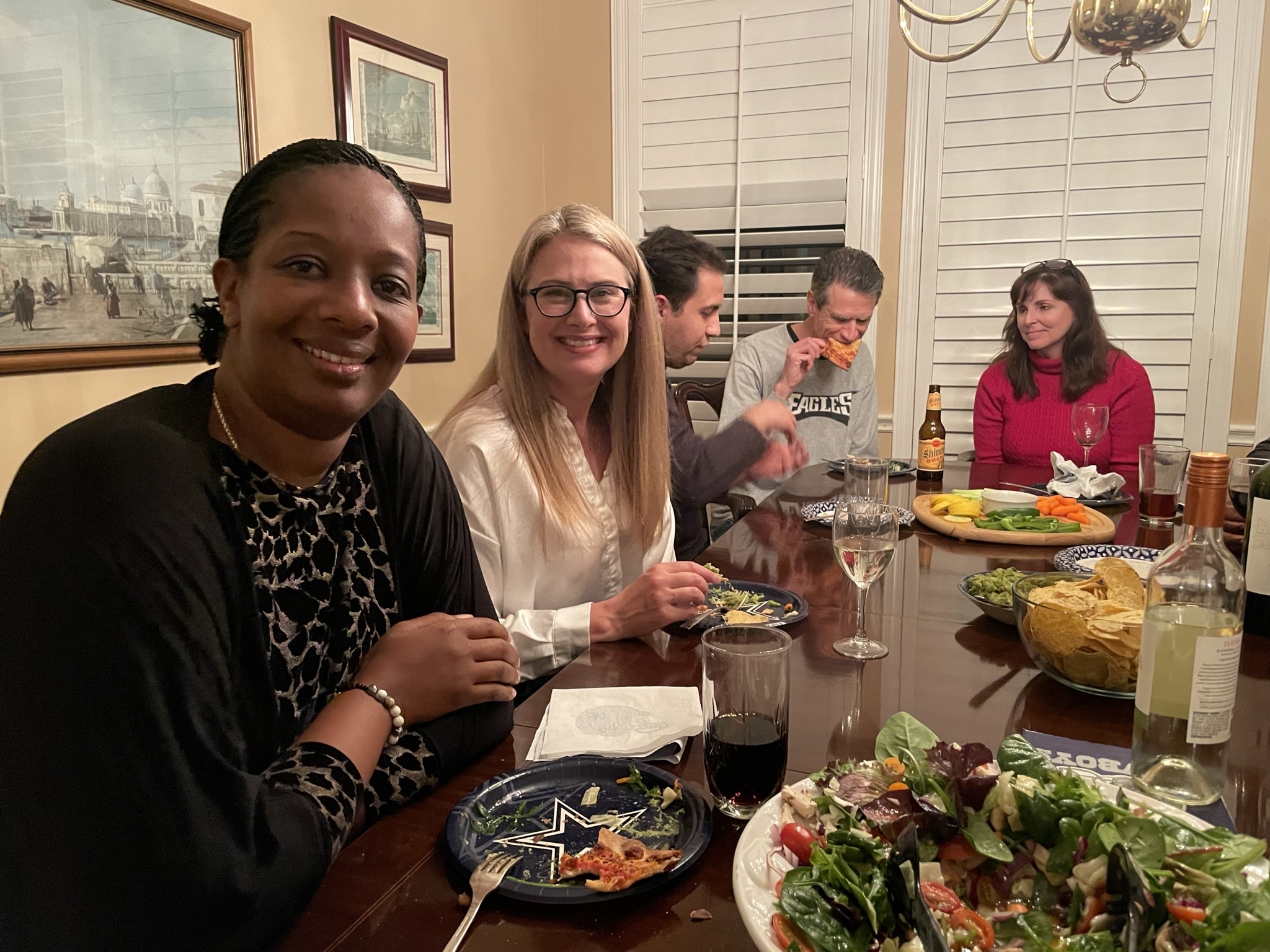 Hosting international visitors over dinner at volunteer's home